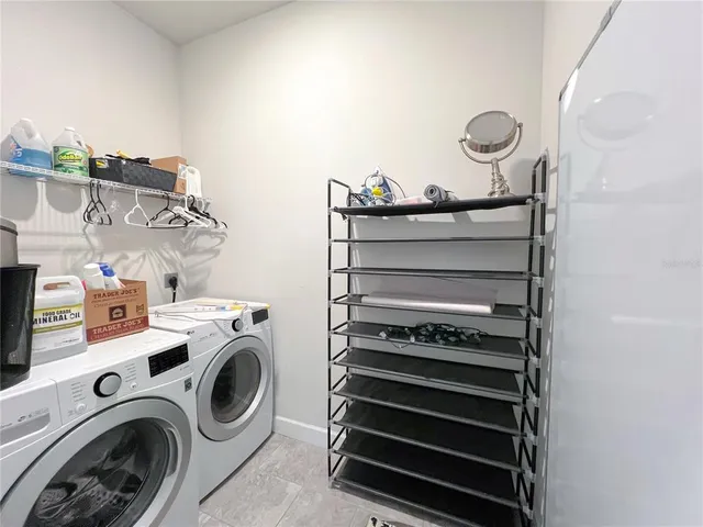 a view of washer and dryer in a utility room