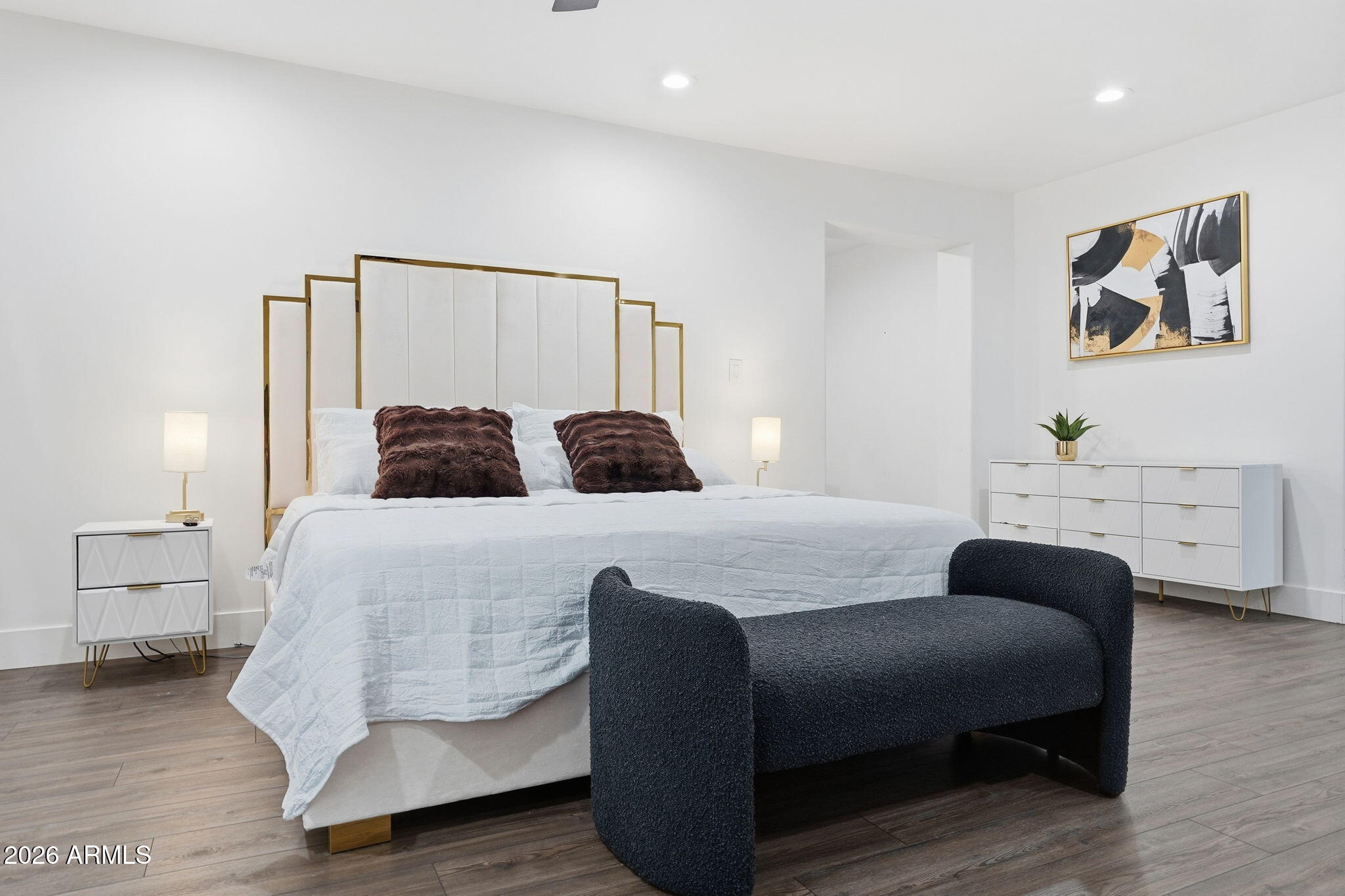 5009 East Wethersfield Road Scottsdale, AZ 85254 - Photo 14 of 30 a bedroom with a bed and a lamp