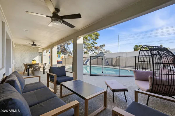a view of a porch with furniture