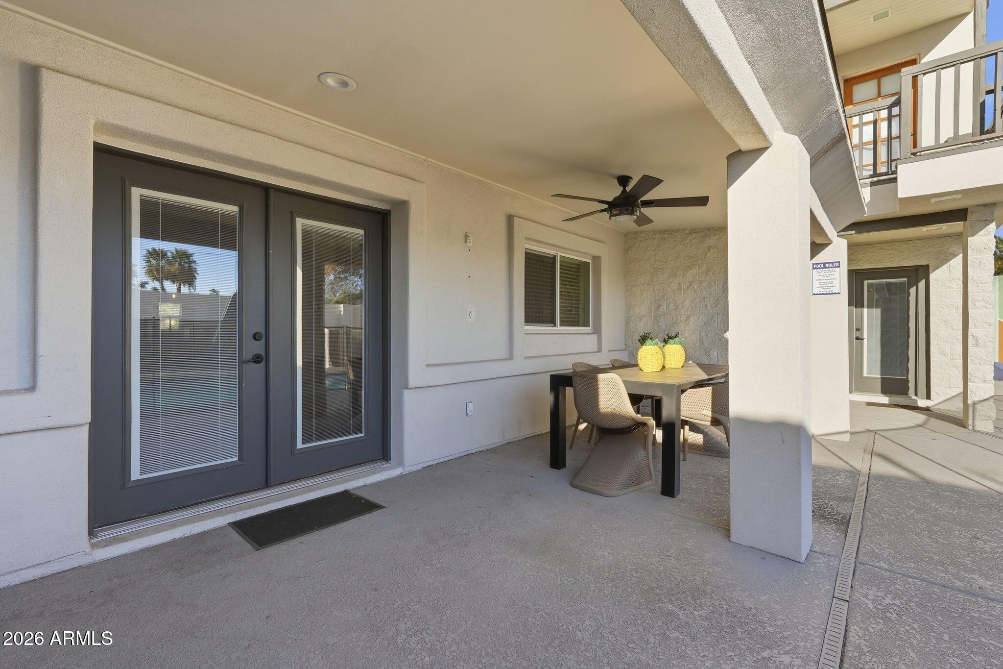 5009 East Wethersfield Road Scottsdale, AZ 85254 - Photo 25 of 30 a living room with furniture and a window