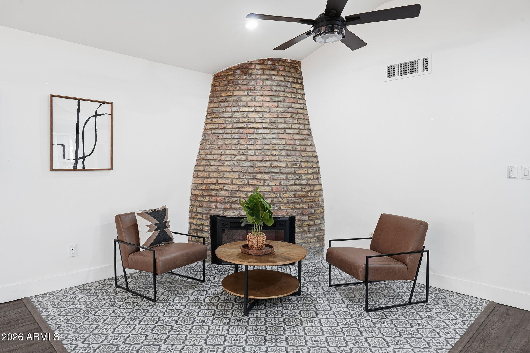 5009 East Wethersfield Road Scottsdale, AZ 85254 - Photo 9 of 30 a living room with furniture and a rug