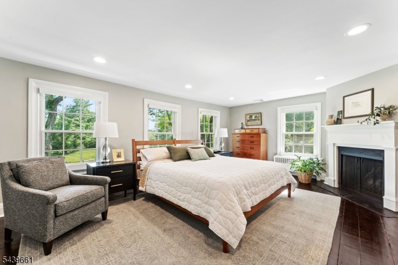 29 Bedens Brook Road Skillman, NJ 08558 - Photo 27 of 50 a bedroom with a large bed couch and windows