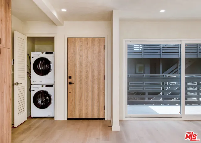 a view of kitchen with wooden floor