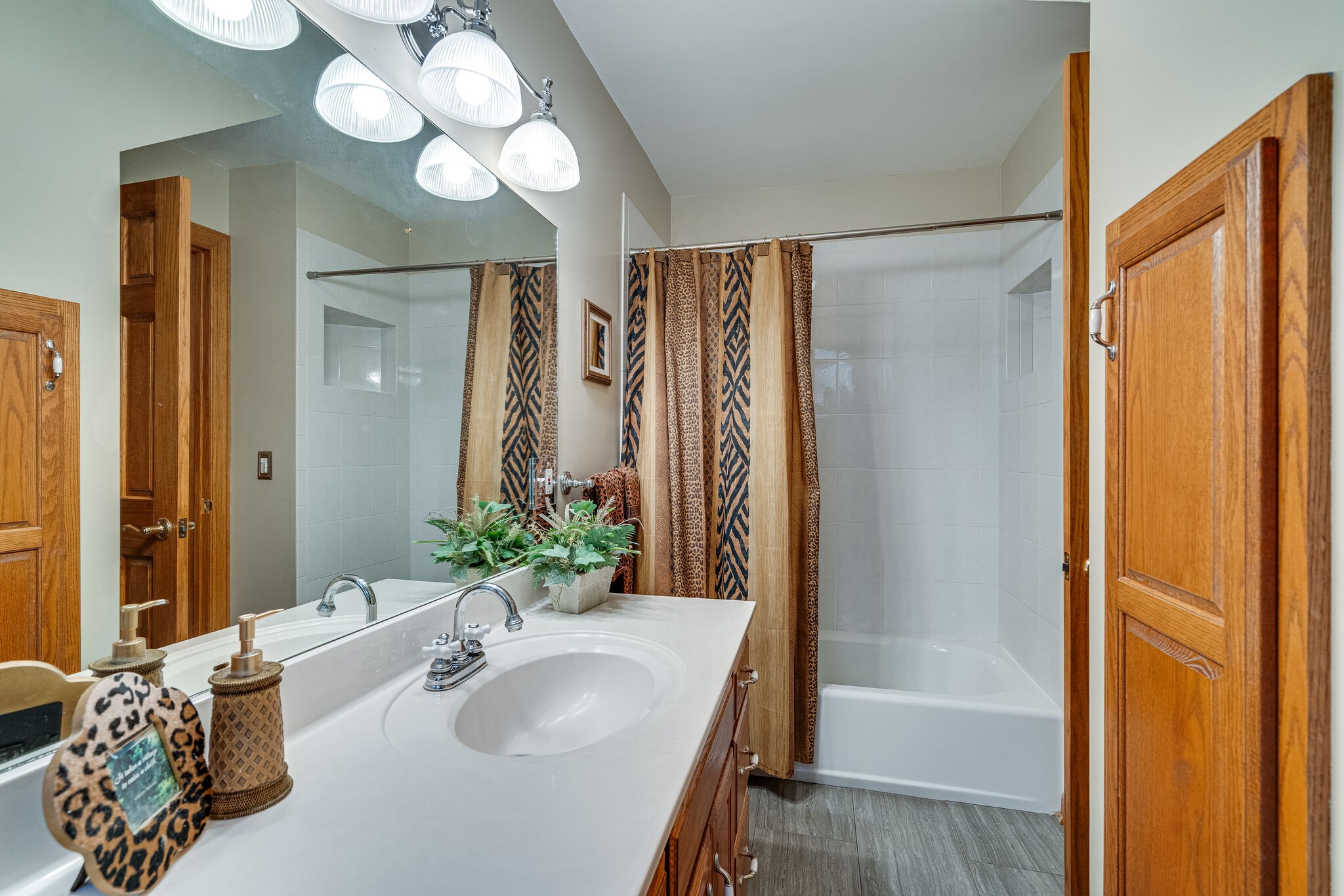 1823 Fortner Road Dickson, TN 37055 - Photo 24 of 55 a bathroom with a granite countertop sink and a mirror
