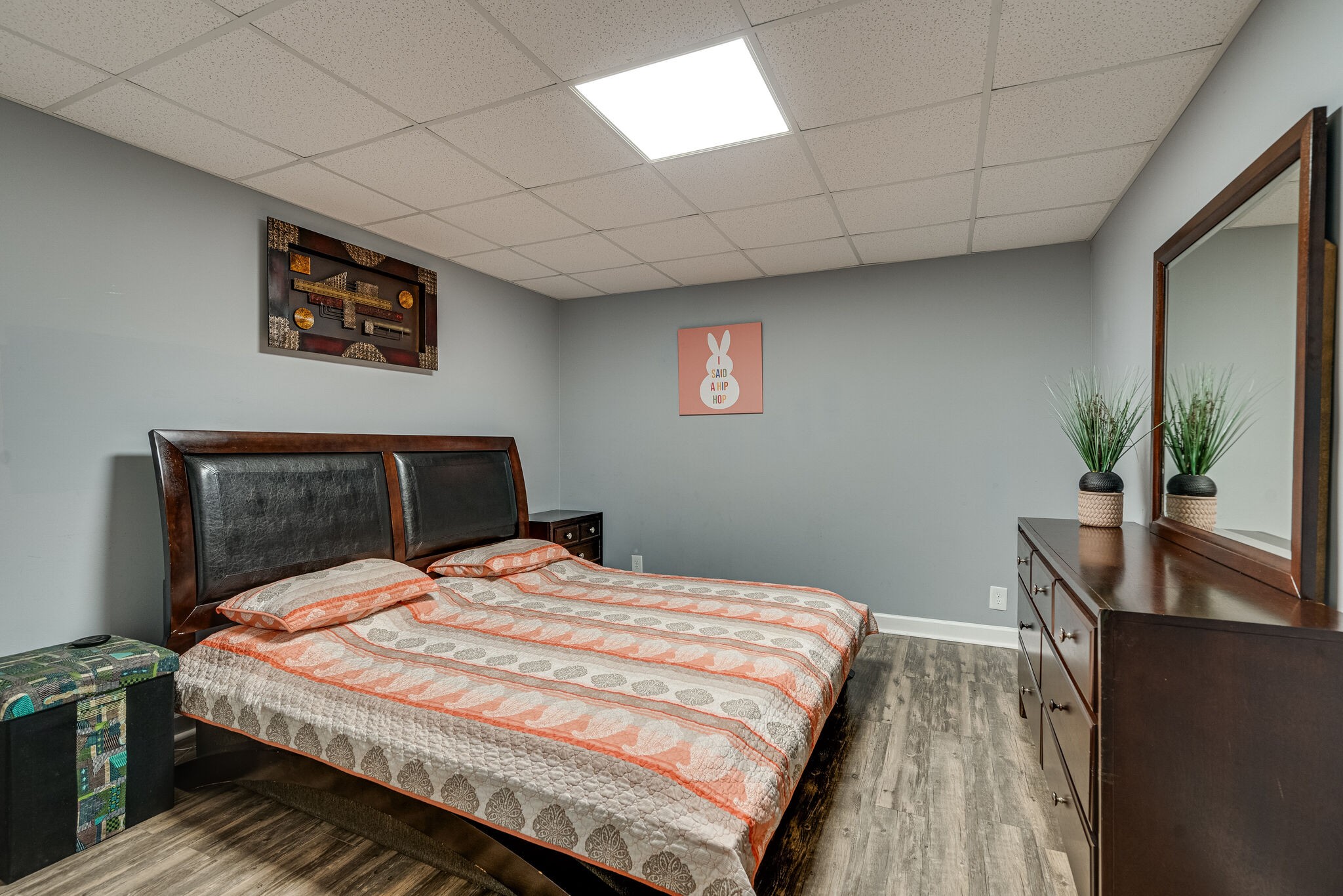 1823 Fortner Road Dickson, TN 37055 - Photo 30 of 55 a bedroom with a large bed and a potted plant