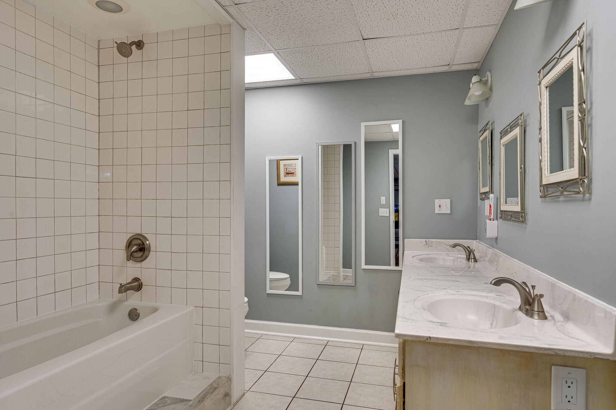 1823 Fortner Road Dickson, TN 37055 - Photo 32 of 55 a bathroom with a sink shower and a mirror