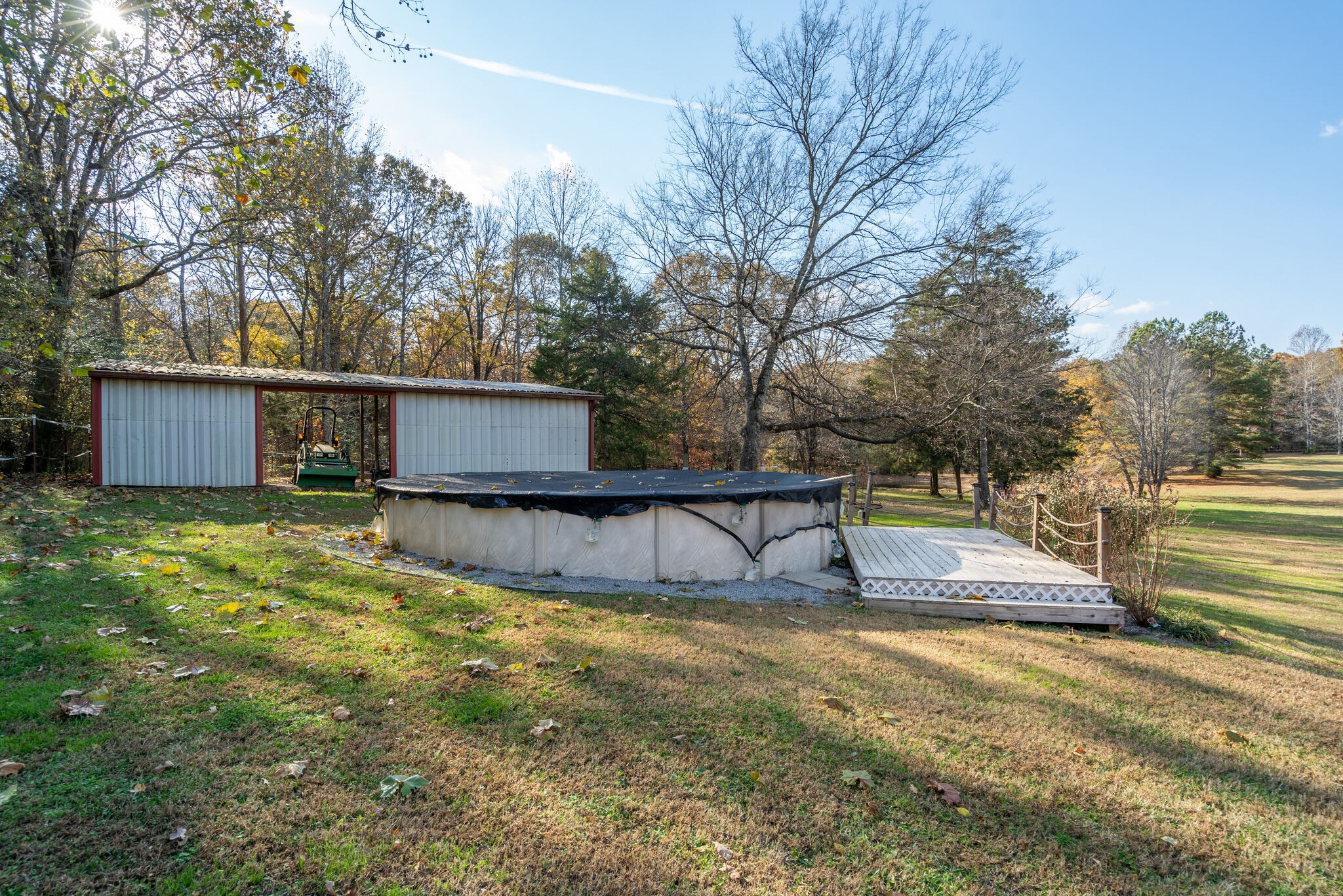 1823 Fortner Road Dickson, TN 37055 - Photo 46 of 55 a swimming pool with outdoor seating and yard