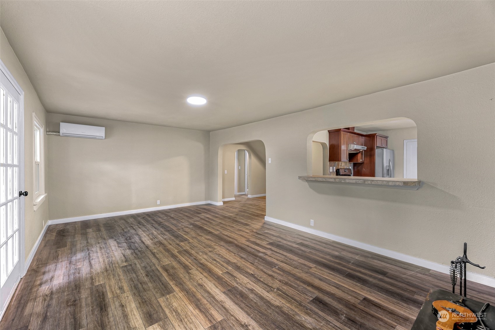 1102 Nevada Street Bellingham, WA 98229 - Photo 7 of 40 a view of empty room with wooden floor and fan