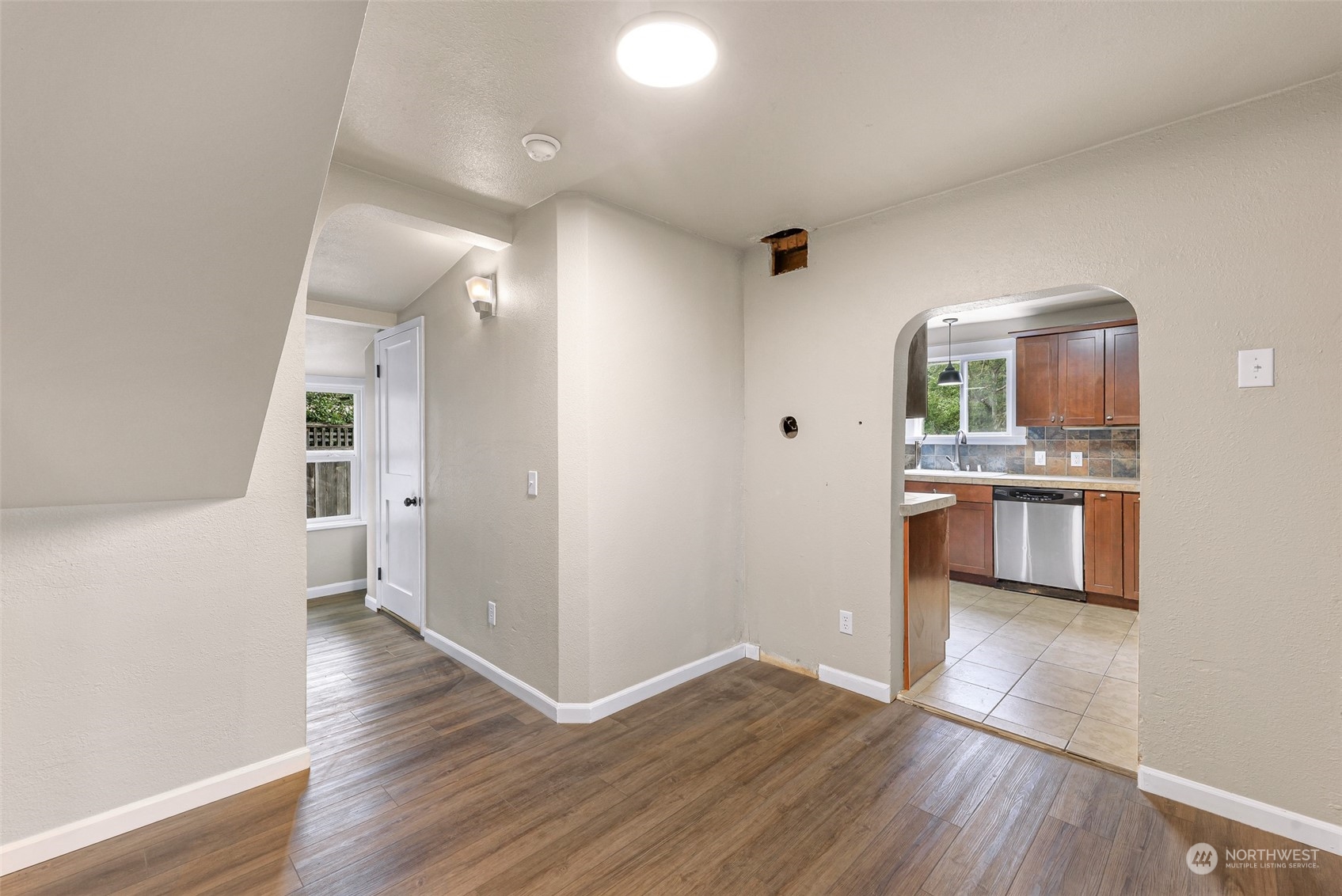 1102 Nevada Street Bellingham, WA 98229 - Photo 10 of 40 a view of a kitchen with a sink and a refrigerator