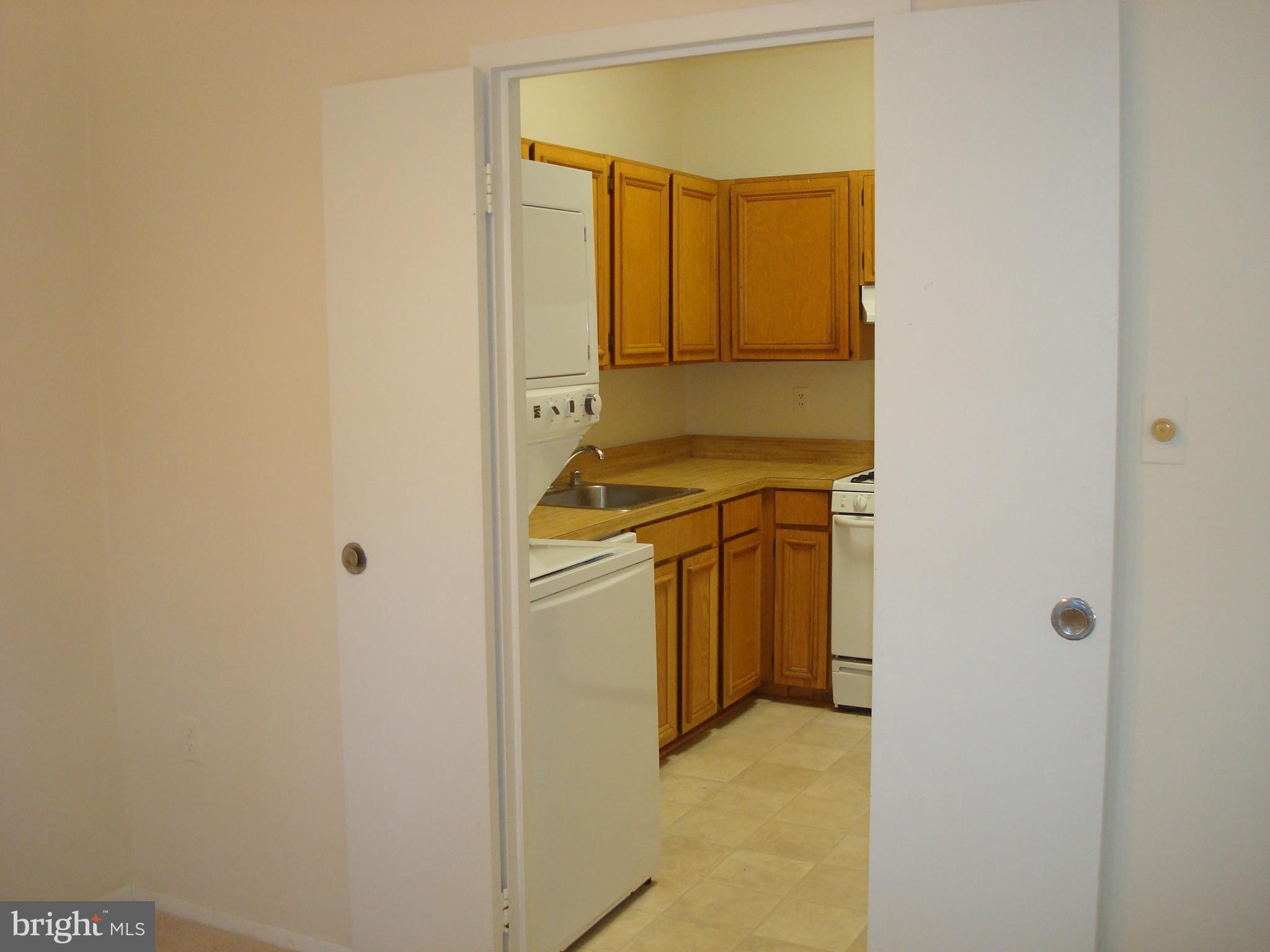18612 Walkers Choice Road, Unit 2 Gaithersburg, MD 20886 - Photo 8 of 26 French doors leading to the kitchen