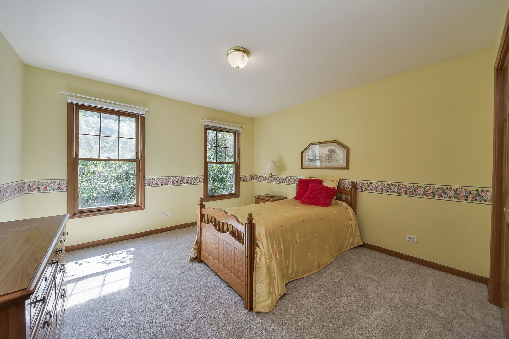 439 Lewis Road Geneva, IL 60134 - Photo 15 of 24 a bedroom with a bed and window