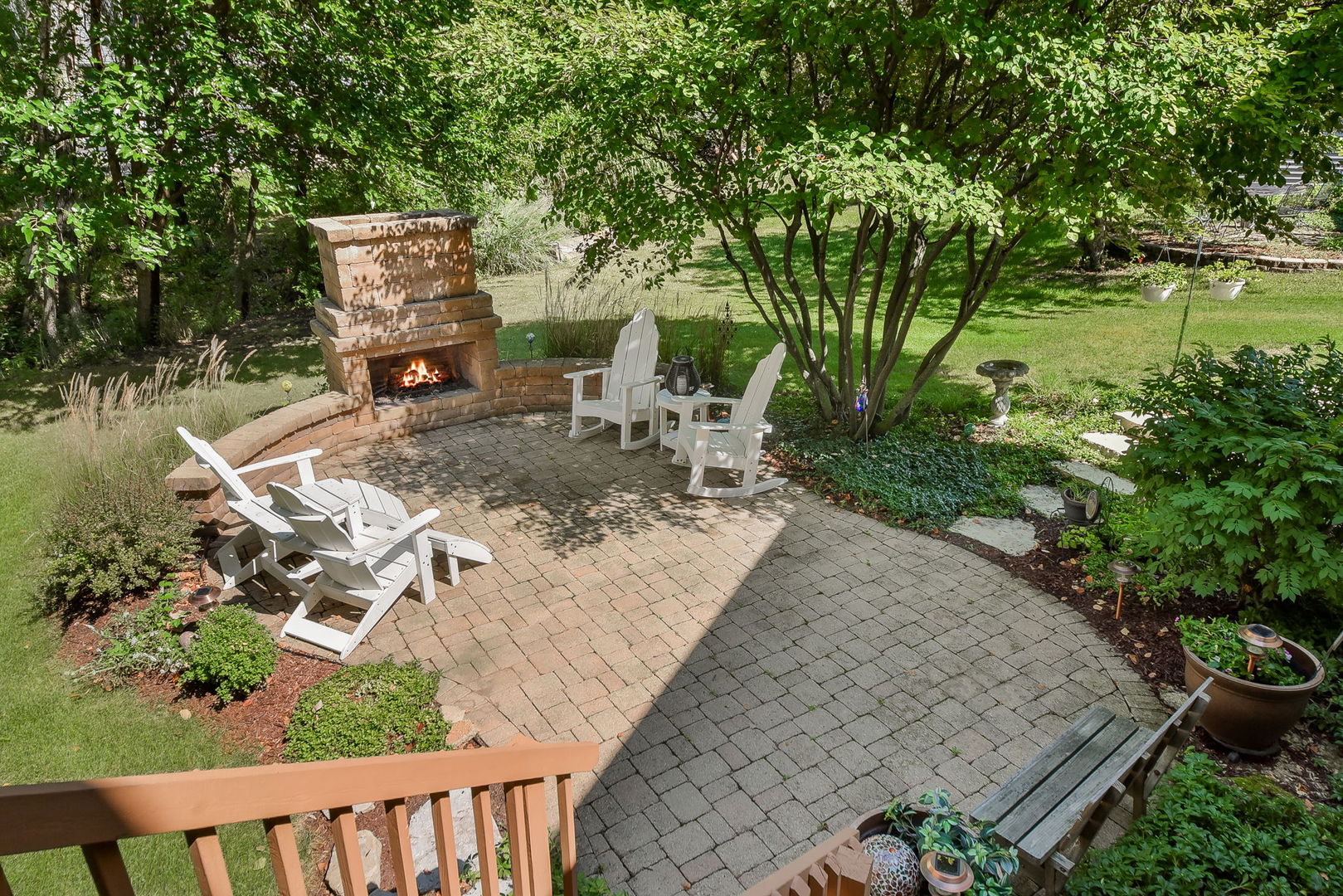 439 Lewis Road Geneva, IL 60134 - Photo 18 of 24 a view of a backyard with sitting area