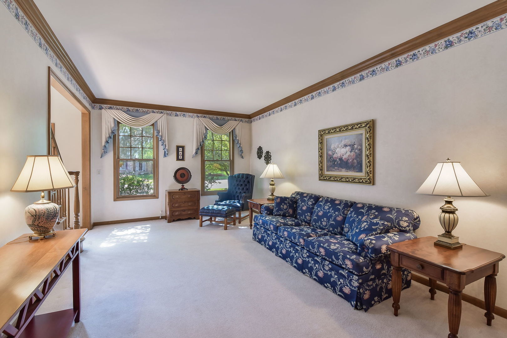 439 Lewis Road Geneva, IL 60134 - Photo 4 of 24 a living room with furniture and a large window