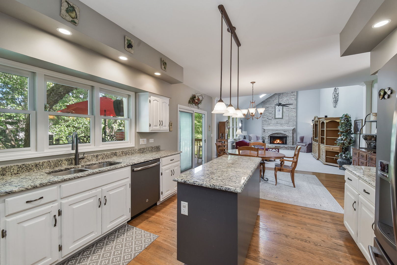 439 Lewis Road Geneva, IL 60134 - Photo 7 of 24 a kitchen with granite countertop lots of counter top space