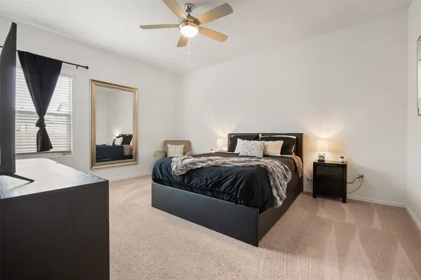 a kitchen with a refrigerator and a sink