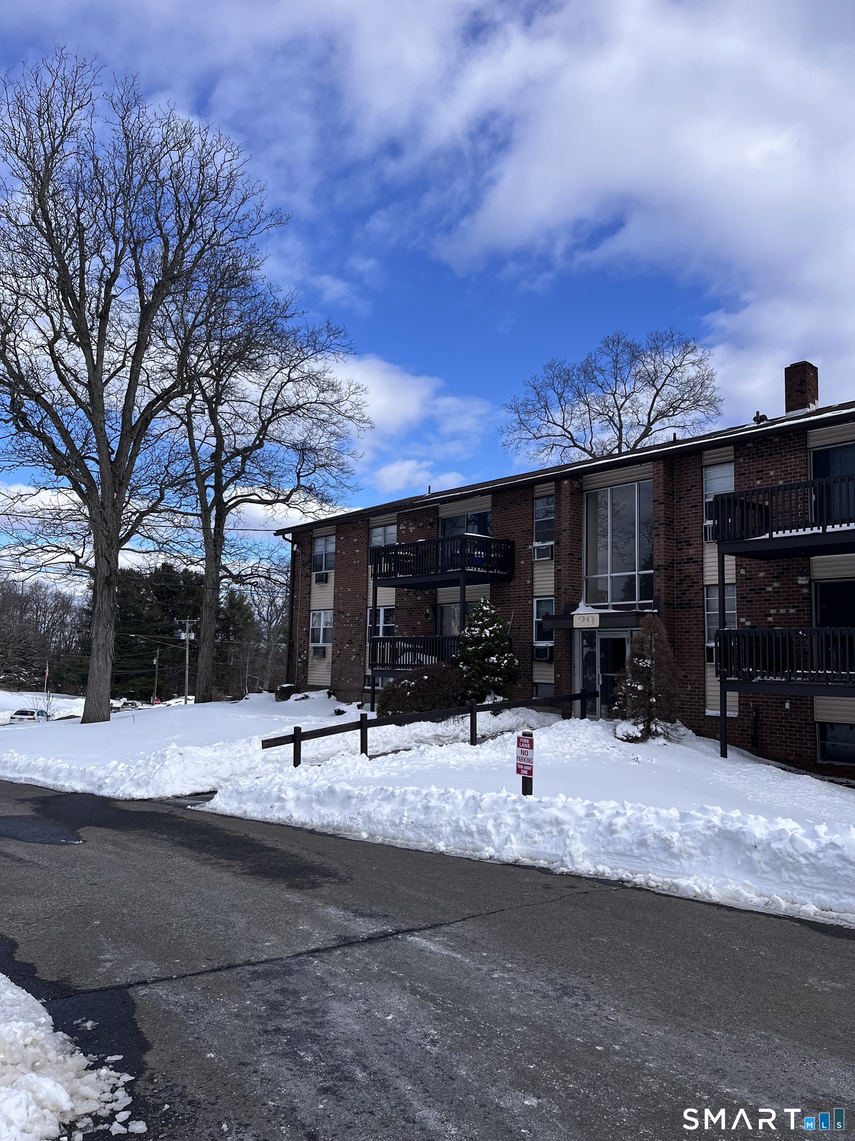 29 Balance Rock Road, Unit 5 Seymour, CT 06483 - Photo 2 of 10 a view of a house with snow on the road