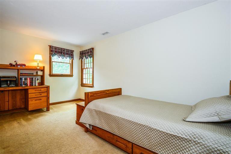 45 Long Hill Road Dennis, MA 02638 - Photo 18 of 26 a bedroom with a bed and dresser