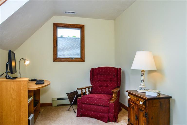 45 Long Hill Road Dennis, MA 02638 - Photo 20 of 26 a room with furniture and a window