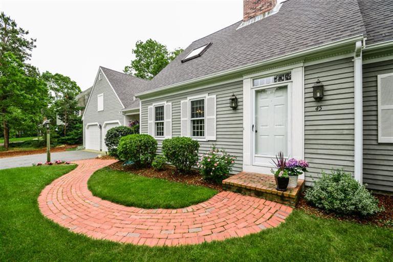 45 Long Hill Road Dennis, MA 02638 - Photo 2 of 26 a view of a house with a yard