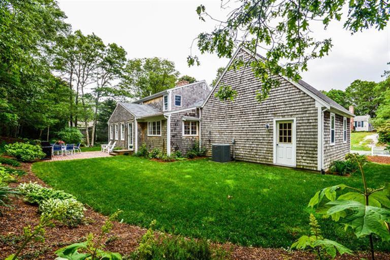 45 Long Hill Road Dennis, MA 02638 - Photo 24 of 26 a view of a house with backyard
