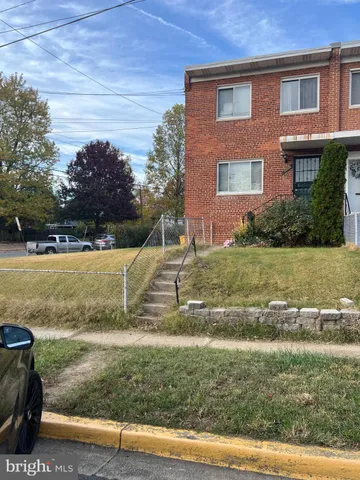 a view of a yard with an outdoor space