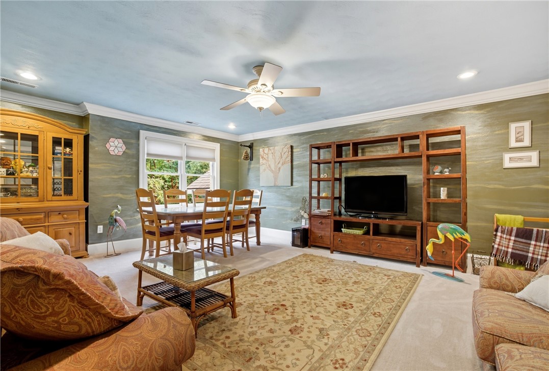 2328 Spindrift Road Virginia Beach, VA 23451 - Photo 26 of 50 Carpeted living room featuring ornamental molding, ceiling fan, and recessed lighting