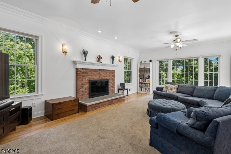 12 Oak Hill Road Bernards, NJ 07920 - Photo 11 of 33 a living room with furniture and a fireplace