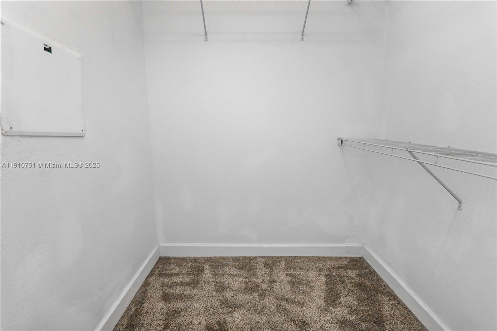 1830 Radius Drive, Unit 1119 Hollywood, FL 33020 - Photo 27 of 53 a view of a room with racks on the wall