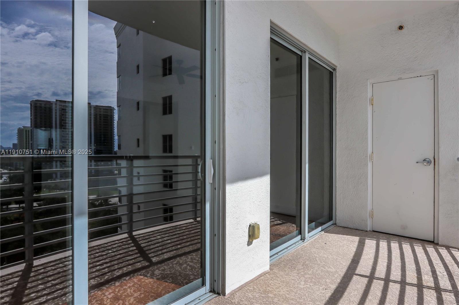 1830 Radius Drive, Unit 1119 Hollywood, FL 33020 - Photo 32 of 53 a view of a balcony from door