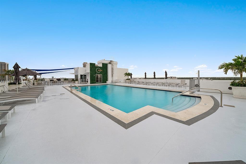 1830 Radius Drive, Unit 1119 Hollywood, FL 33020 - Photo 33 of 53 a view of a balcony with two chairs