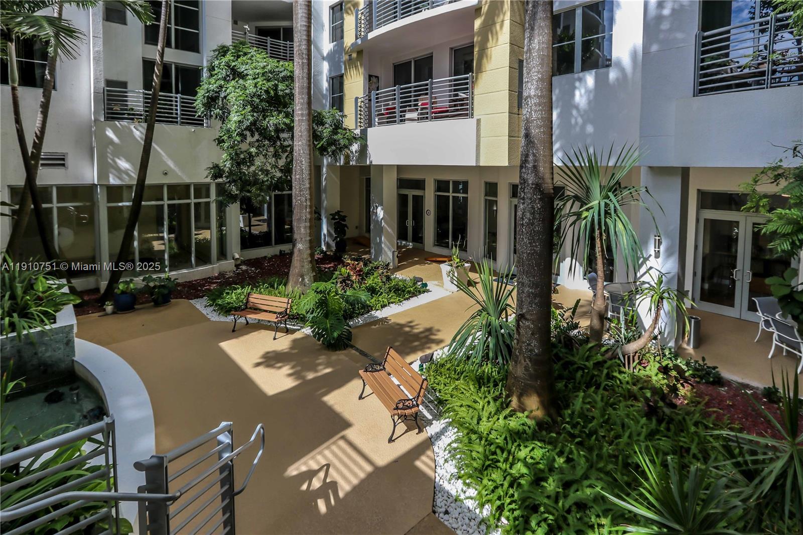 1830 Radius Drive, Unit 1119 Hollywood, FL 33020 - Photo 47 of 53 a view of an house with backyard and sitting area