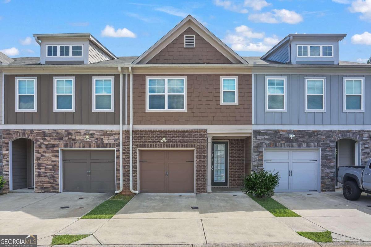 5028 Longview Walk Decatur, GA 30035 - Photo 1 of 1 a front view of a house with yard