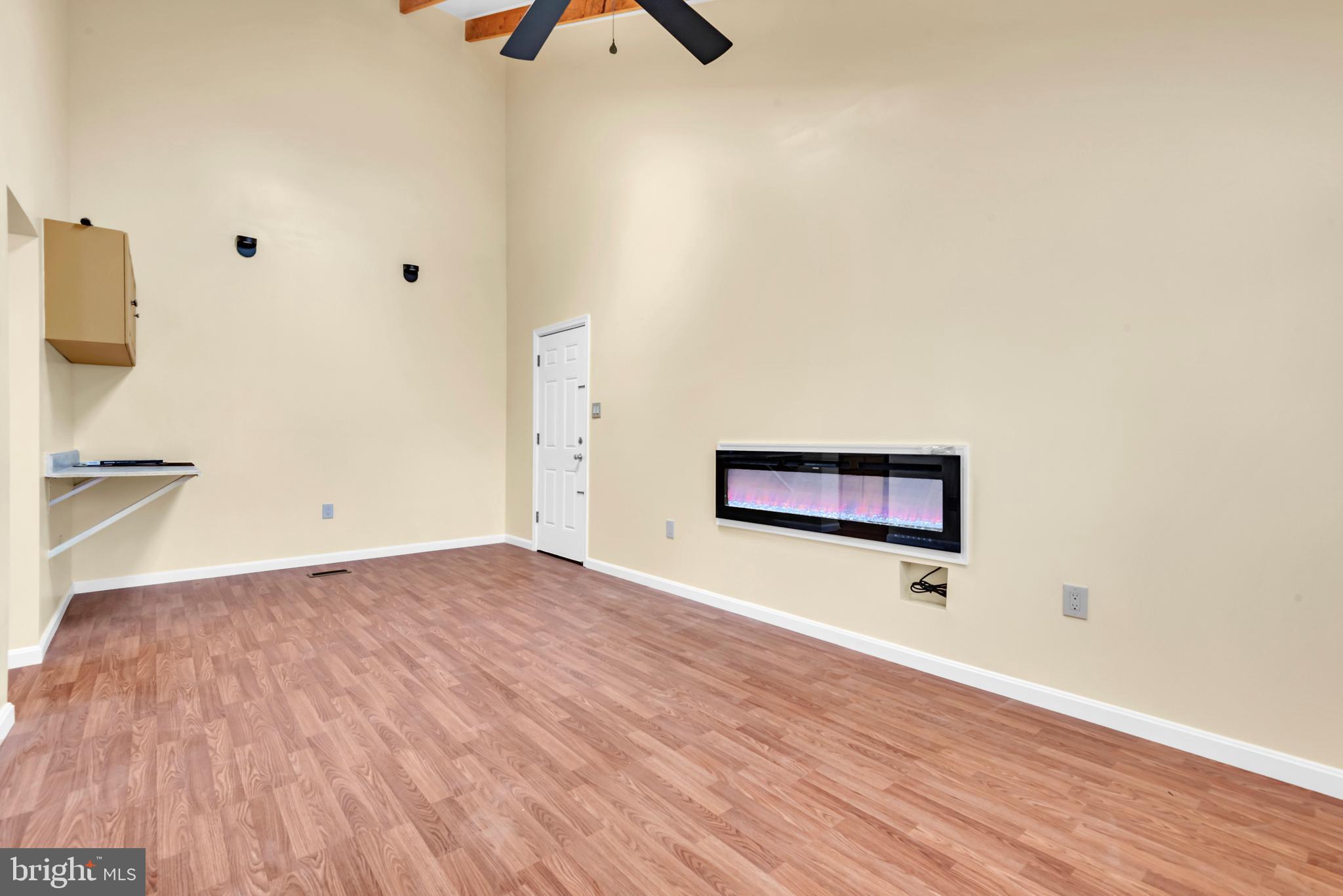 5025 Addison Road Capitol Heights, MD 20743 - Photo 15 of 37 a view of a room with wooden floor