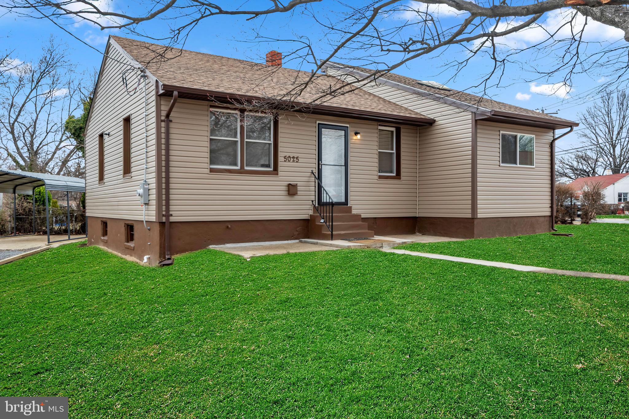5025 Addison Road Capitol Heights, MD 20743 - Photo 2 of 37 a view of a house with a backyard