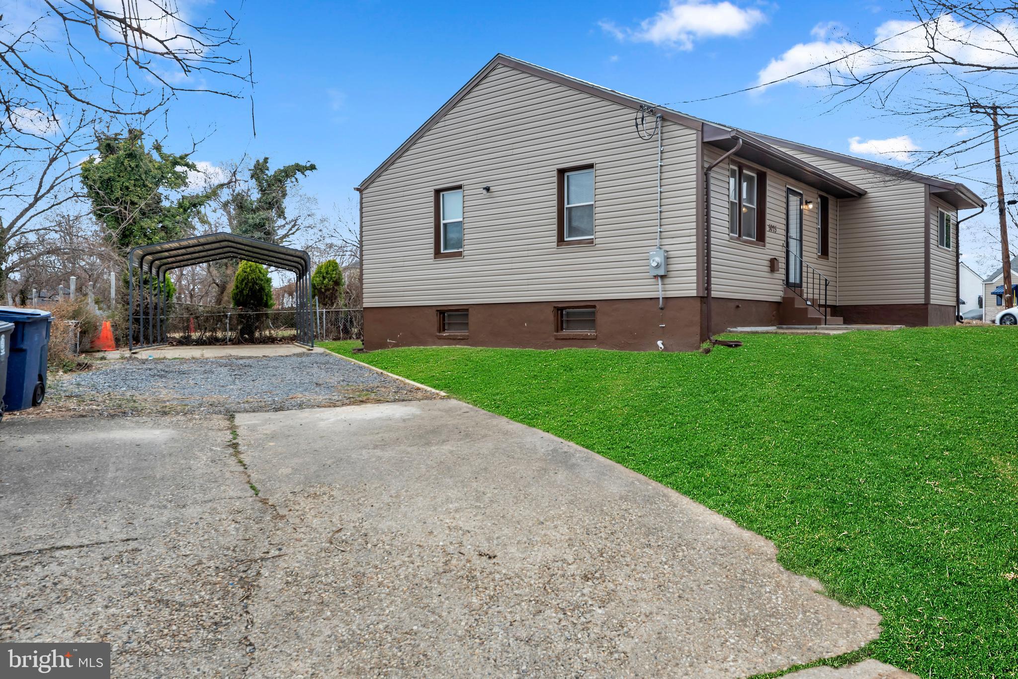 5025 Addison Road Capitol Heights, MD 20743 - Photo 35 of 37 a front view of house with yard
