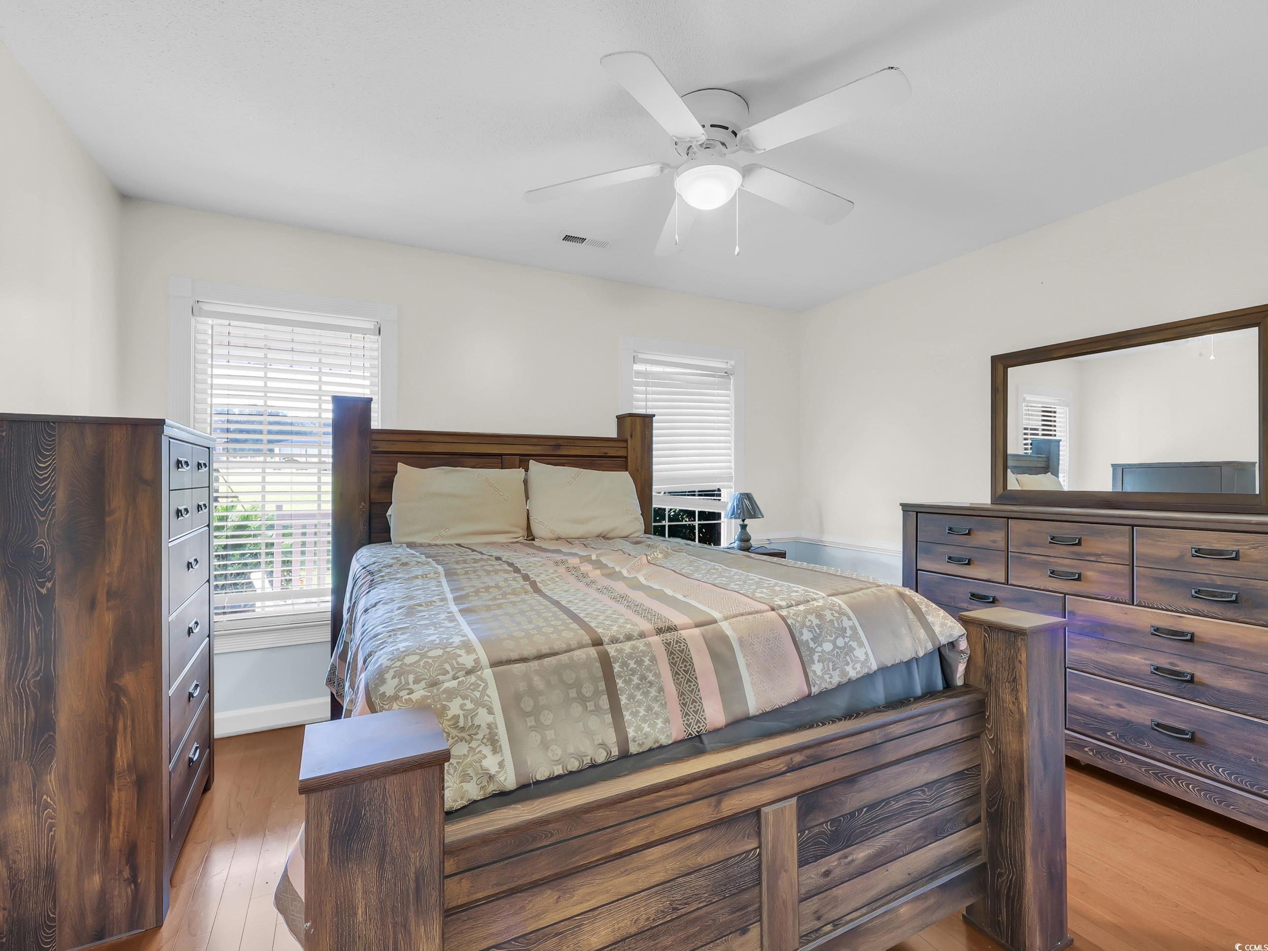 3731 Love Lane Conway, SC 29527 - Photo 17 of 32 Bedroom featuring wood finished floors and ceiling fan