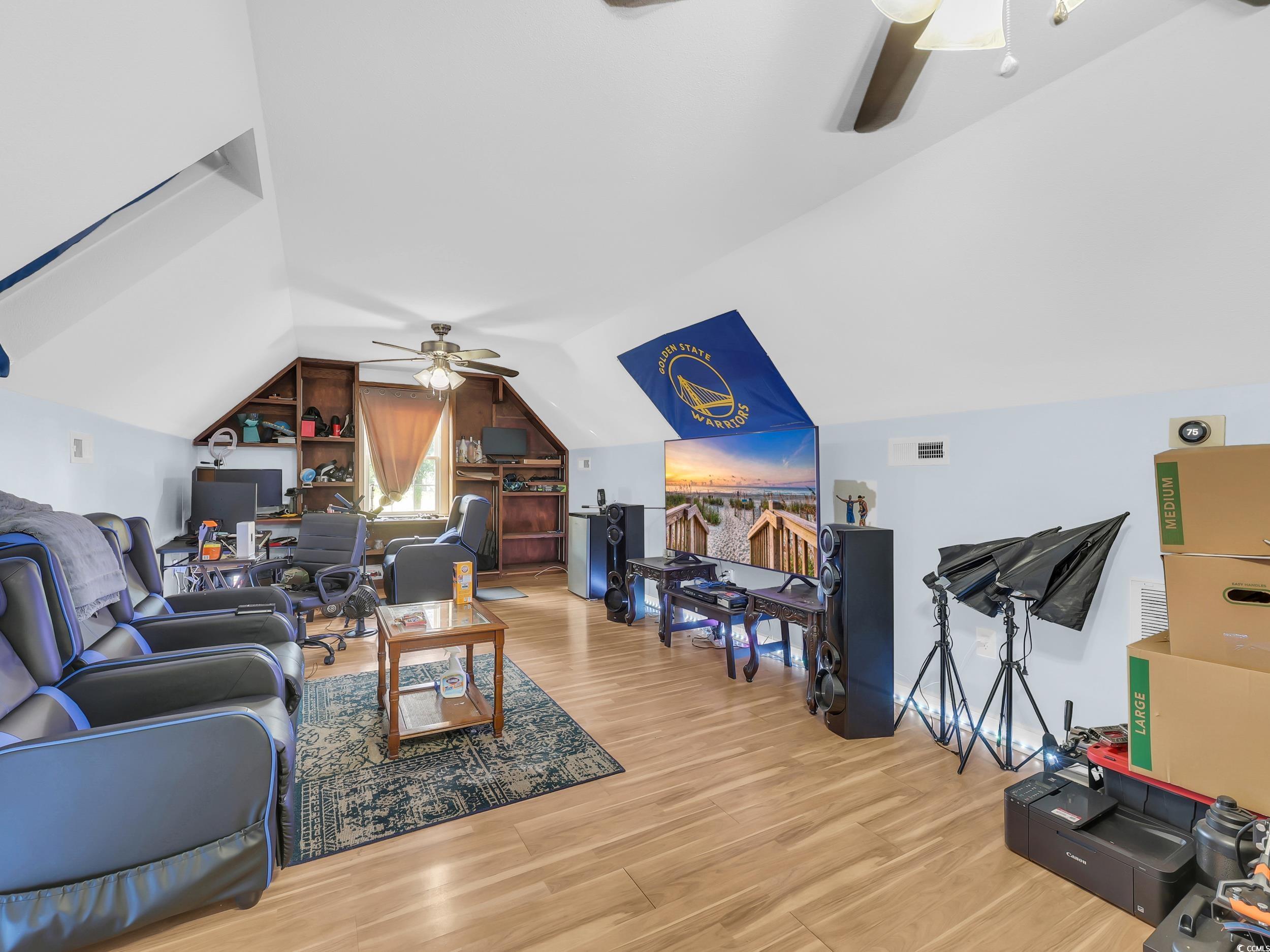 3731 Love Lane Conway, SC 29527 - Photo 21 of 32 Living room featuring ceiling fan, light wood-type flooring, an office area, and lofted ceiling