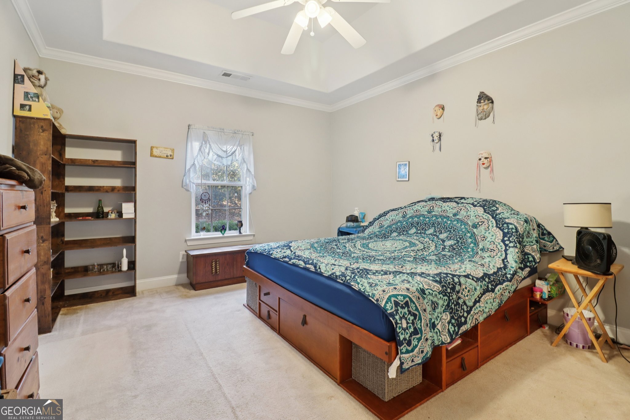 1502 Commonwealth Circle Newnan, GA 30263 - Photo 11 of 30 a bed sitting in a bedroom next to a window