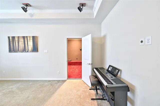 a kitchen with a bed and a dresser