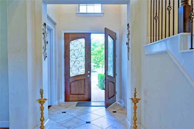 a view of yard with swimming pool and green space