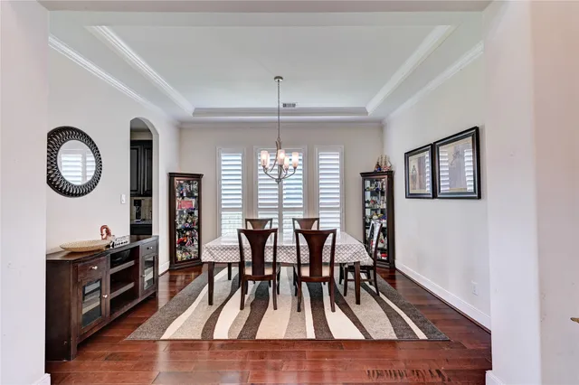 a living room with fireplace furniture and a flat screen tv