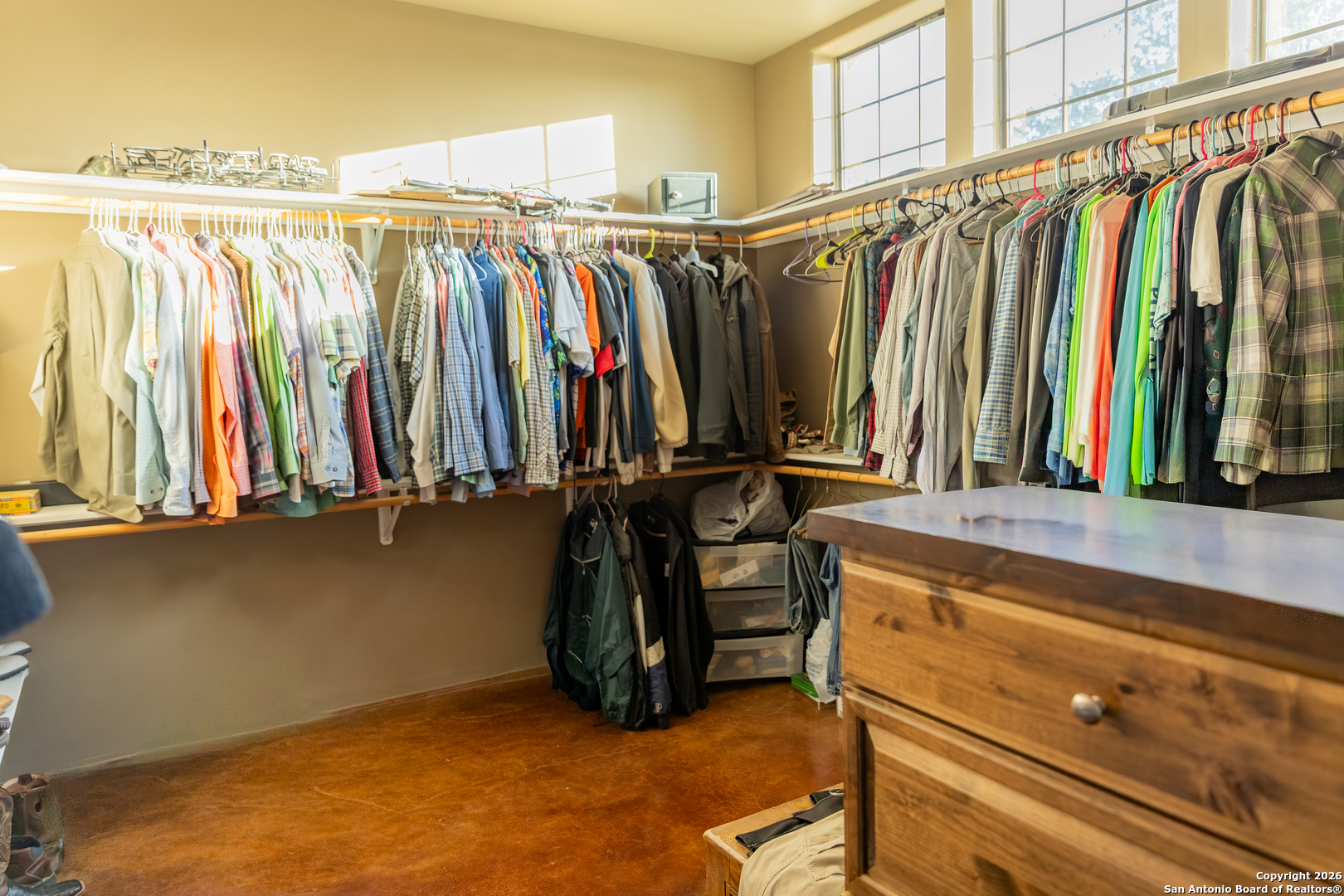 187 Robbins Ranch Road Junction, TX 76849 - Photo 14 of 23 a view of walk in closet with clothes and shoes