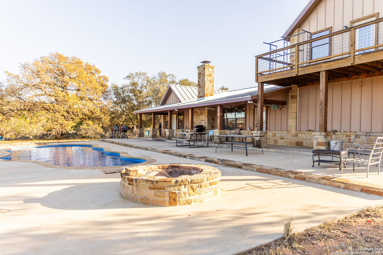 187 Robbins Ranch Road Junction, TX 76849 - Photo 22 of 23 a view of a swimming pool with outdoor seating