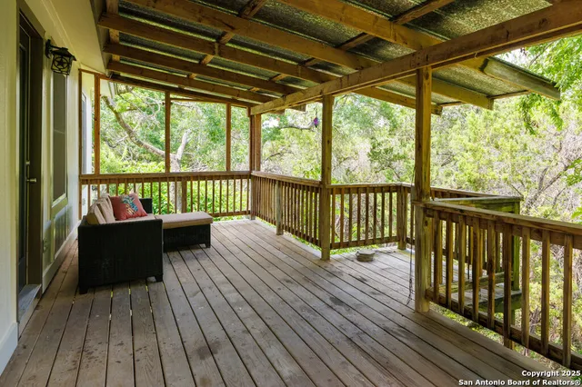 a view of roof deck with wooden floor