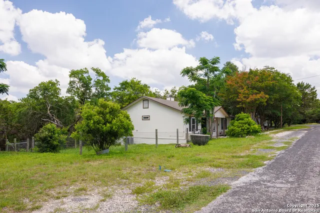 a house view with a garden space