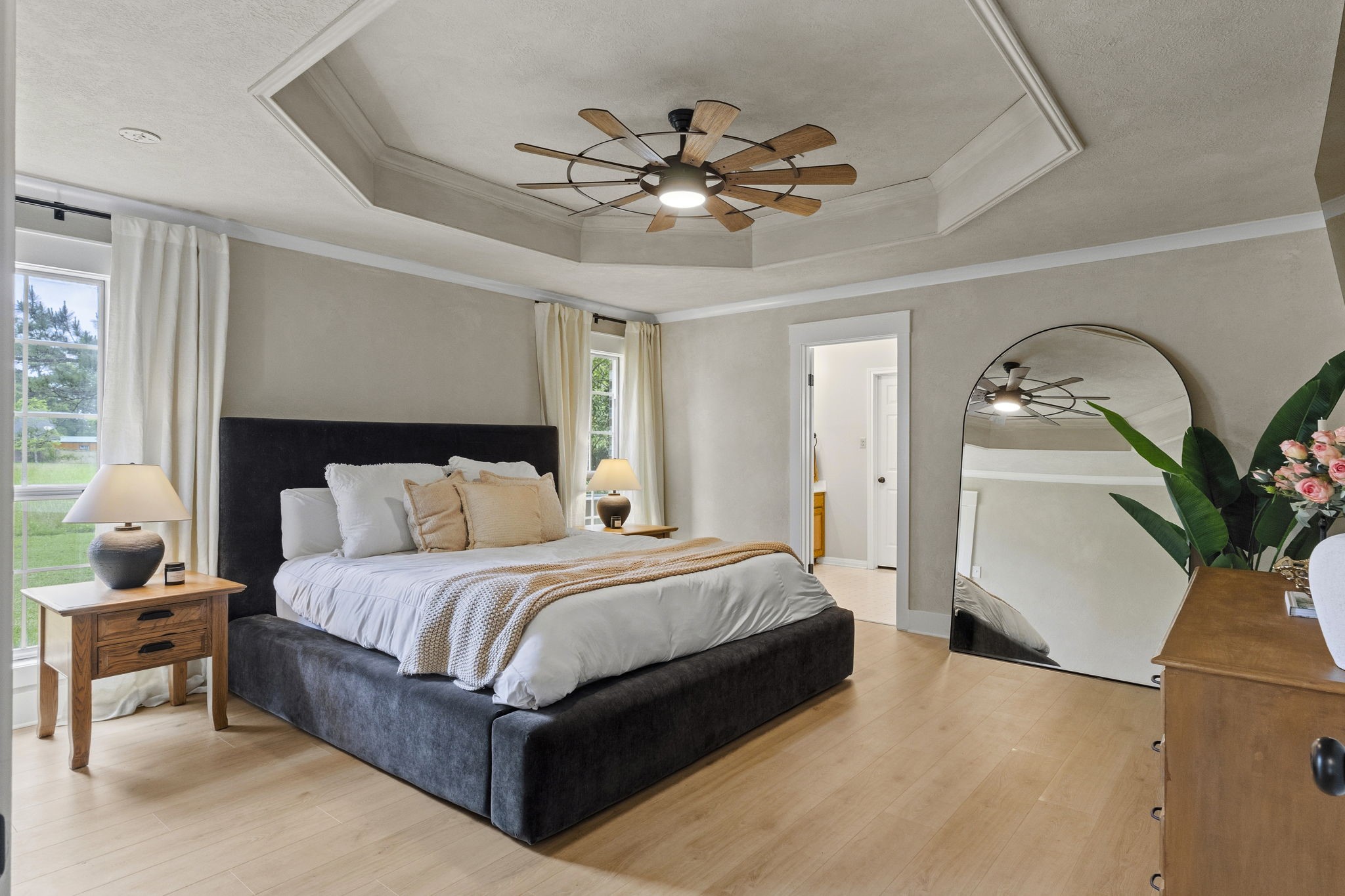 16421 Westbury Road Beaumont, TX 77713 - Photo 13 of 29 a bedroom with a bed and window