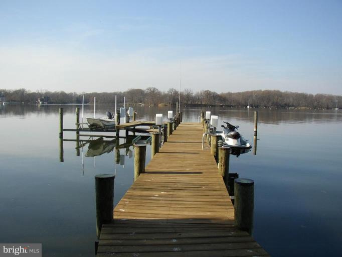 pier with jest ski lifts and boat lifts.