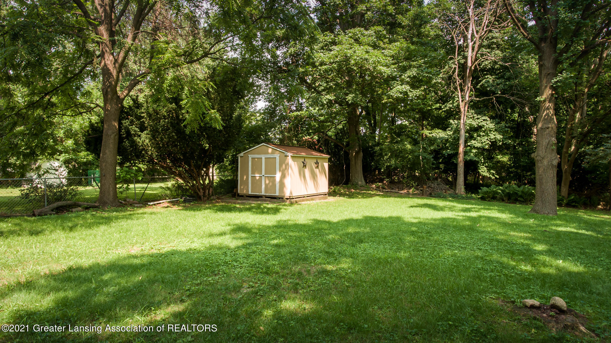 3025 Pleasant Grove Road Lansing, MI 48910 - Photo 20 of 21 Backyard