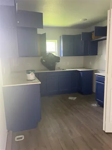 a room with wooden cabinets