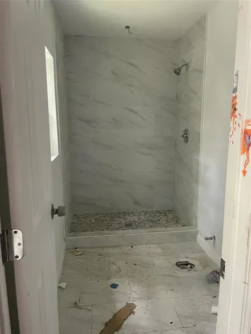 a bathroom with a bathtub